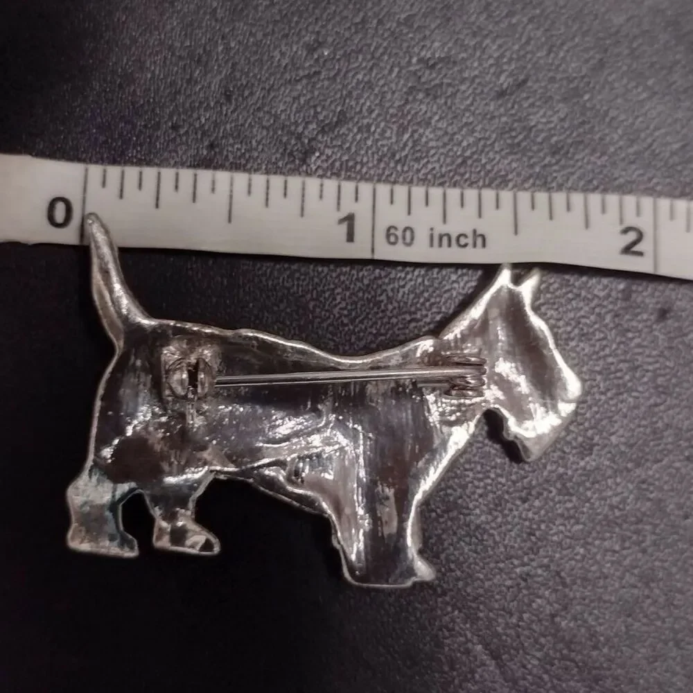 Silver tone terrier dog brooch